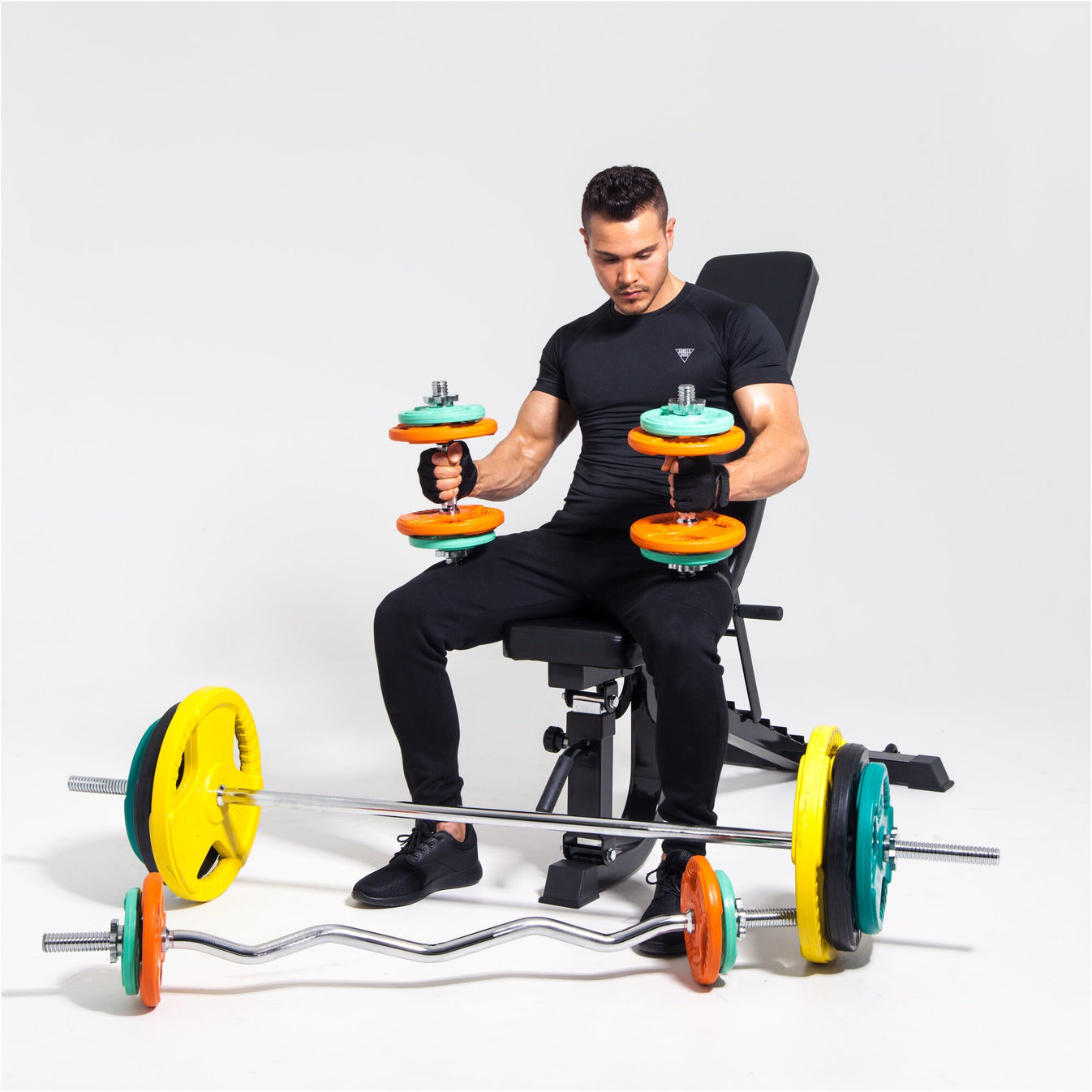 Lot de disques de poids olympiques 4 x 2,5 + 4 x 5 kg Gripper Fonte Revêtement caoutchouc - 50 mm