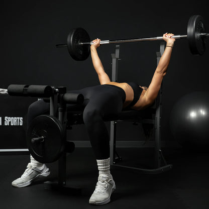 Halterbank met leg curl