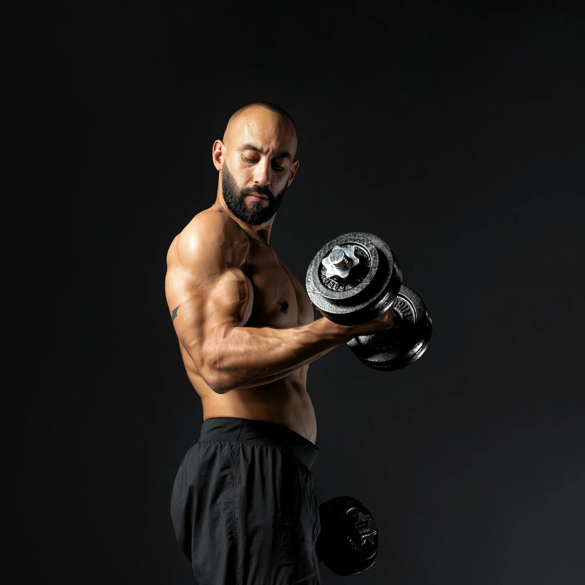 Dumbellset 30 kg gietijzer zwart