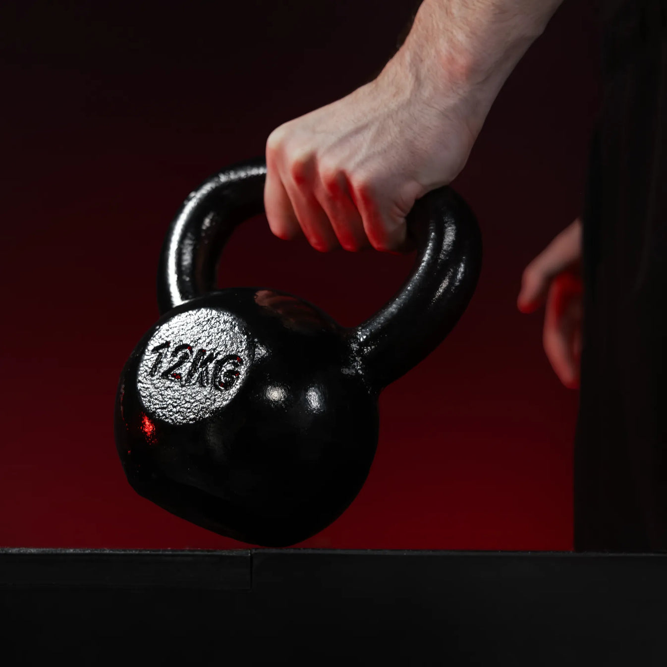 Kettlebell (16 kg) en fonte noire